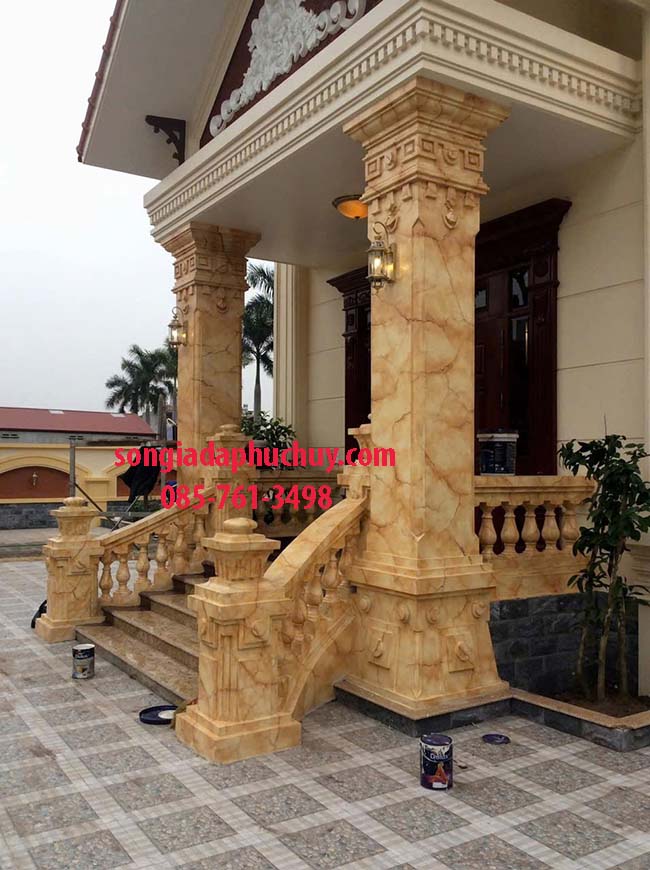 mặt tiền sơn giả đá màu vàng